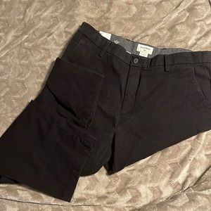 Docker classic Fit pants. Zip closure pocket on right